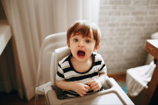 Bad Breath in Kids - a kid with an open mouth