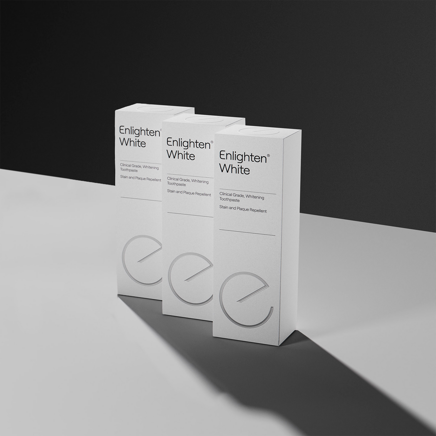 3 Enlighten White toothpastes boxes