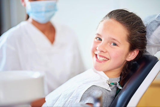 A teen having teeth whitening - Teeth Whitening for Teens: All the Pros & Cons - Enlighten